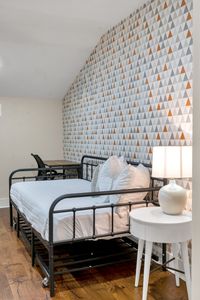 Extra sleeping space with designer wallpaper