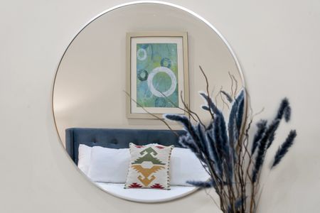 Plush king with a tufted navy headboard