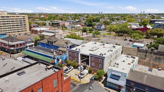 Aerial view blending city energy w/ a quiet, serene retreat.