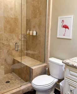 Spa-inspired shower with stone accents