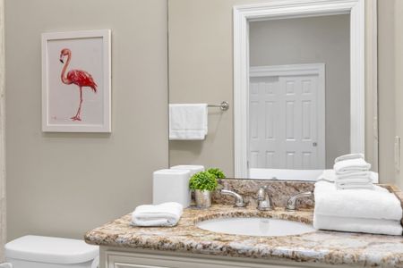Granite vanity with a splash of red art