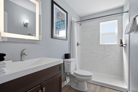 Fresh, clean bathroom w/ all the essentials to refresh & recharge.
