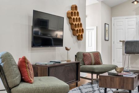 Smart TV beside a honeycomb wine rack