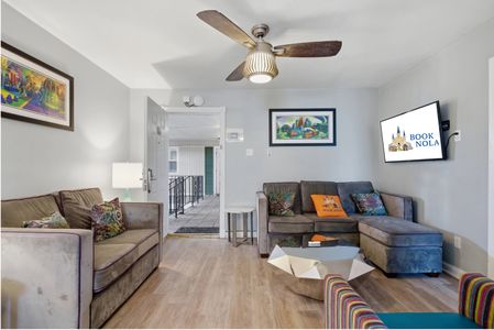 Unit 303 – Inviting living room w/ smart TV & plenty of seating to gather.