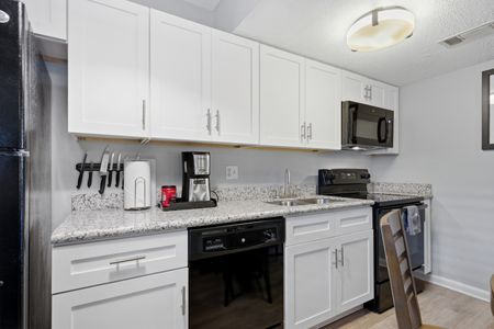 Fully equipped modern kitchen w/ ample counter space