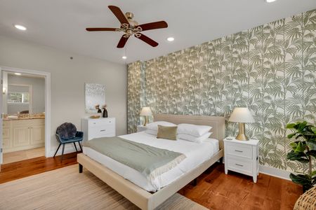 Ceiling fan and palm walls for a tropical retreat