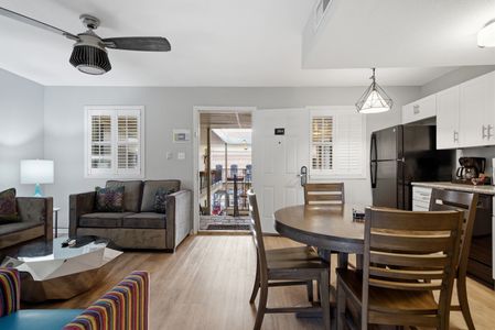 Living room w/ open entryway — bright, airy & easy to settle into.