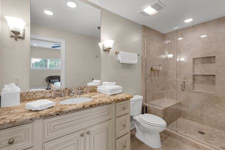 Spa-inspired bath with sconce lighting
