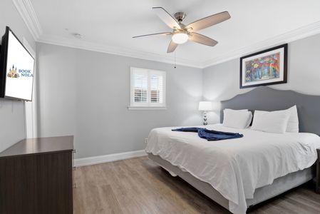 Unit 206 king bedroom w/ elegant, clean styling & a restful ambiance.