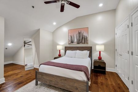 Blush art and red lamps for a romantic touch
