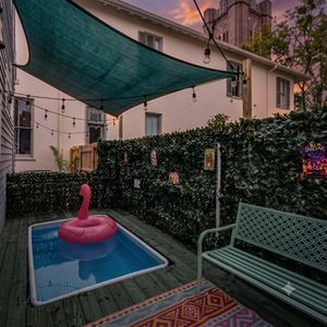 Private plunge pool w/ a pink flamingo float — fun & ready to enjoy.