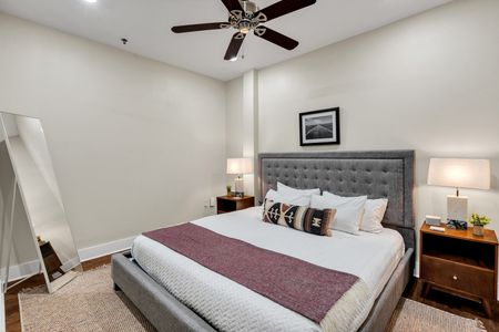 Boutique-style bedroom with framed art