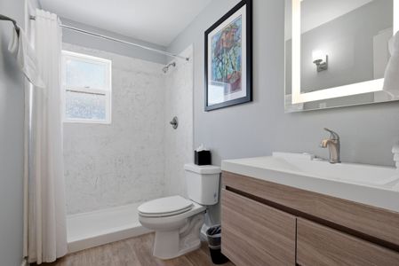 Clean, well-stocked bathroom w/ a tub & all the essentials for a fresh start to your day.