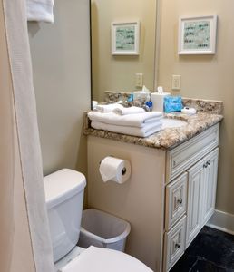 Modern bathroom vanity with granite countertop and ample storage