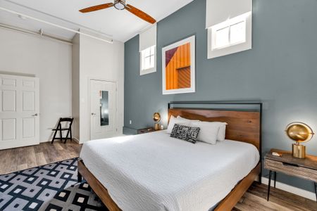 Industrial-chic bedroom with a statement print