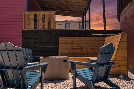 Artsy urban courtyard w/ firepit & local murals — your go-to outdoor hangout.