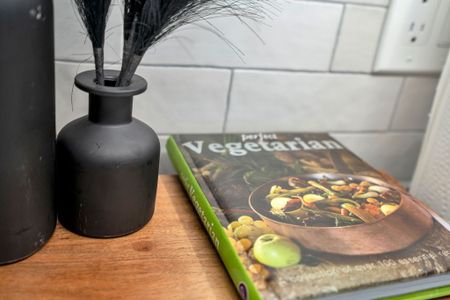 Thoughtful touches like a vegetarian cookbook to inspire your next home-cooked meal