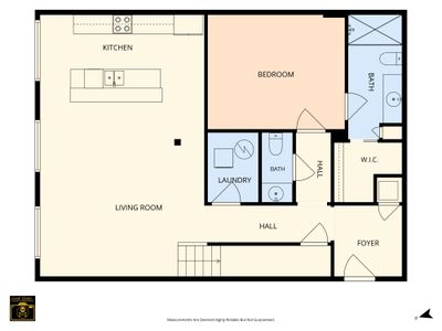 First floor layout with living, kitchen, and laundry