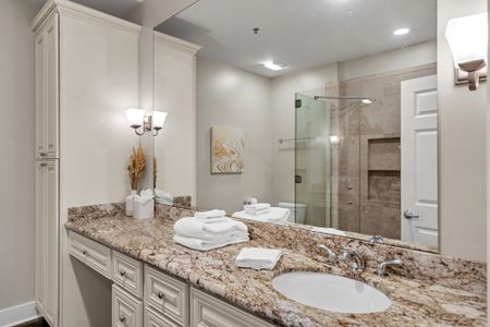Glass shower and granite with spa vibes