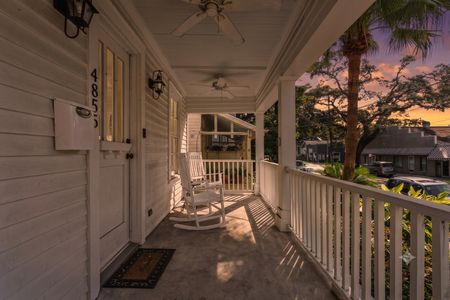Charming front porch w/ seating — perfect for a slow morning or evening unwind.