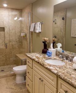 Spa-like bathroom with stone finishes