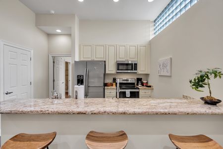 Chef-ready kitchen with sweeping granite counters
