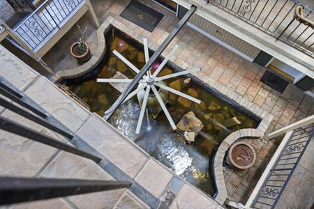 Artful overhead view of the atrium fountain below.