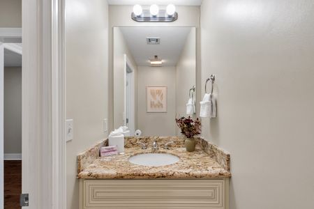 Bright vanity with a pop of wall art