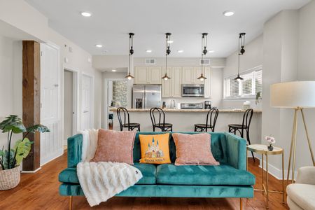 Pendant-lit kitchen overlooking the lounge