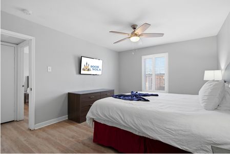 Secondary bedroom w/ a queen bed & a smart TV for a cozy retreat.