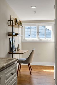 Floating shelves and a desk for remote work