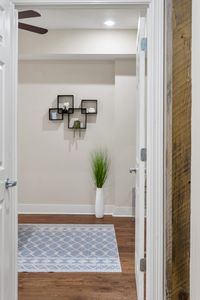 Minimal shelf decor with a touch of greenery