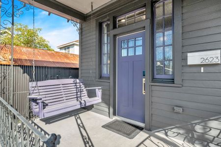 Swing gently on the front porch & watch the neighborhood go by