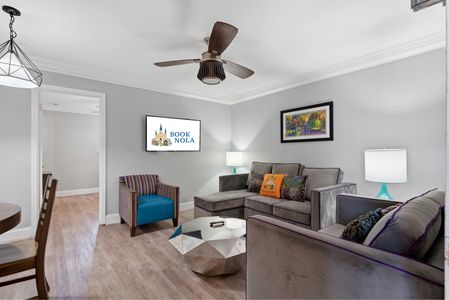 Laid-back lounge area w/ a ceiling fan & eclectic seating for easy hangouts.