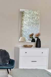 White dresser with dried florals and fresh style