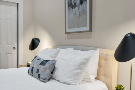 Soft pillows and a sleek reading light