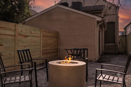 Cozy courtyard firepit made for lingering conversations under the evening sky.