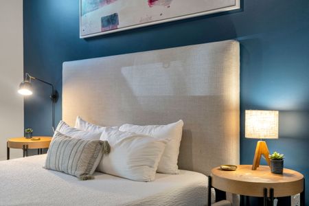 Tall upholstered headboard for lounging in bed