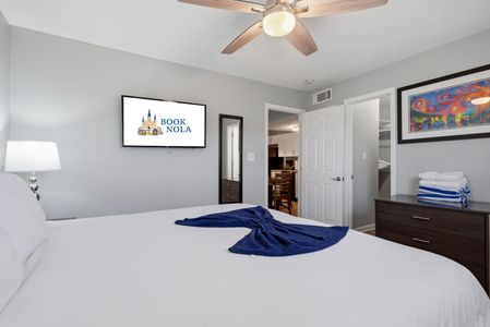 King bedroom w/ smart TV for cozy nights in.