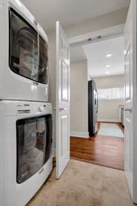 Stacked washer and dryer tucked out of sight