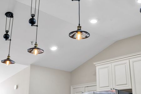 Industrial pendants under soaring ceilings
