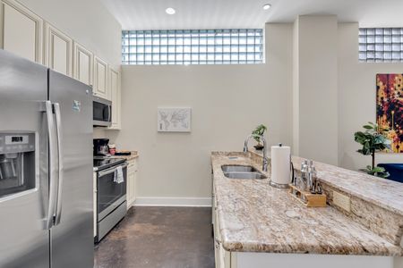 Galley kitchen with clerestory windows