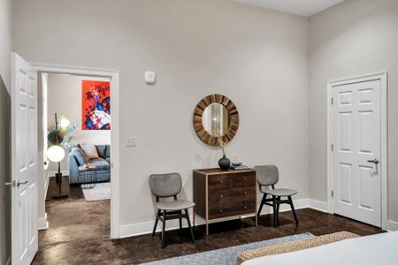 Sitting nook with a statement wood mirror