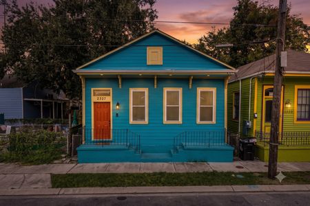 Charming turquoise exterior that's as welcoming as the inside.