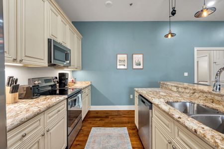 Sky blue kitchen wall with framed accents