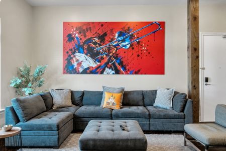 Sink into the sectional under gallery-sized art