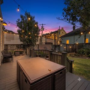 Expansive outdoor space w/ mature trees & classic New Orleans character.