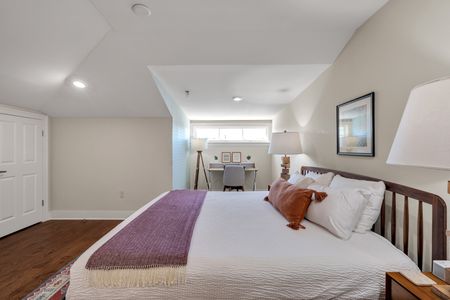 King bed with a peaceful window view