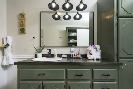 Stylish bathroom interior showcasing modern convenience and cozy comfort, reflecting the hospitality found in Broken
