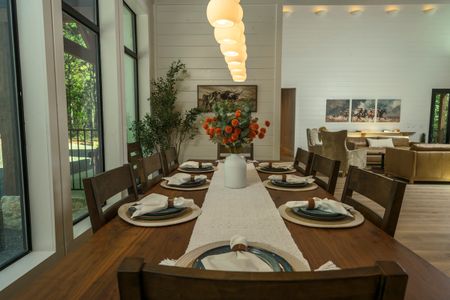 Elegant dining room at Bear Lake Lodge, a luxury retreat in Broken Bow, Oklahoma, featuring